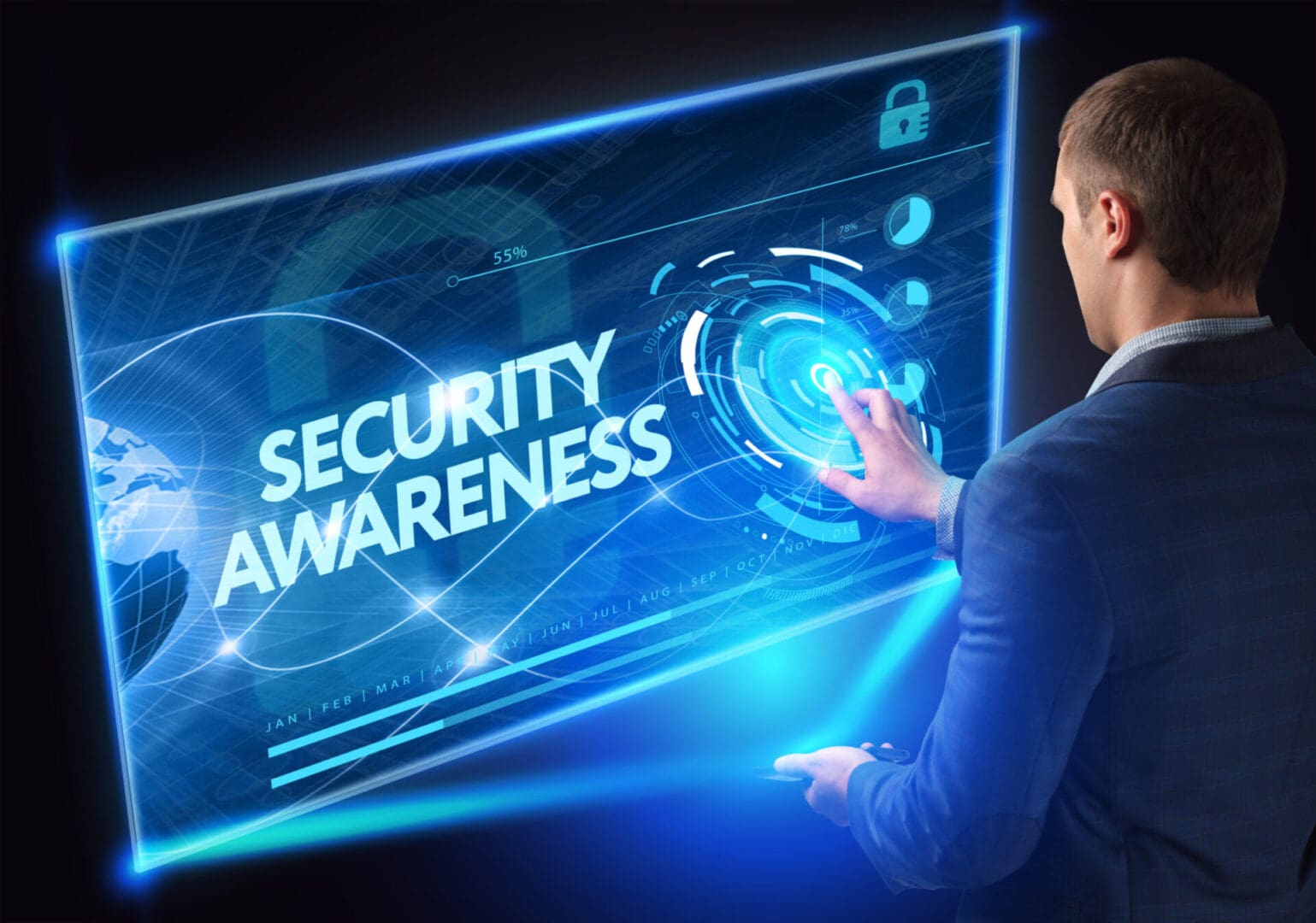 A man is standing in front of a screen that says " security awareness ".