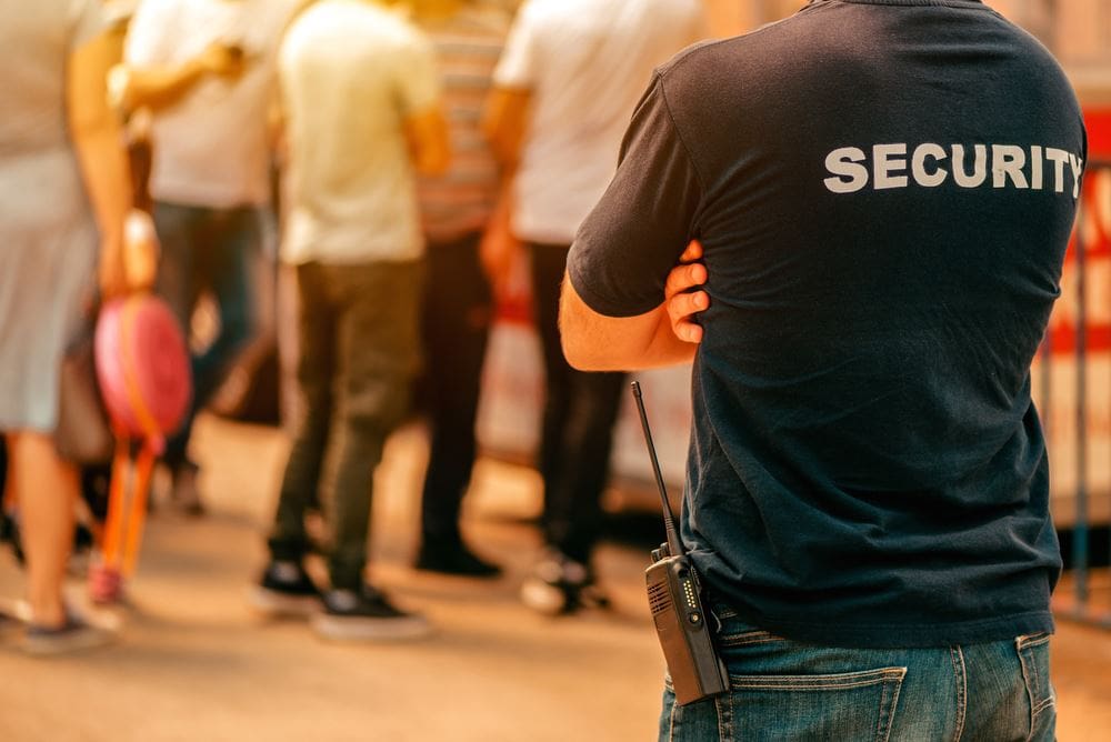 A person standing in front of a group of people.